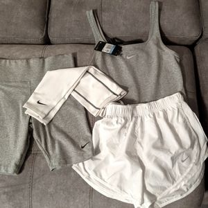 Nike shorts, body suit, arm sleeves